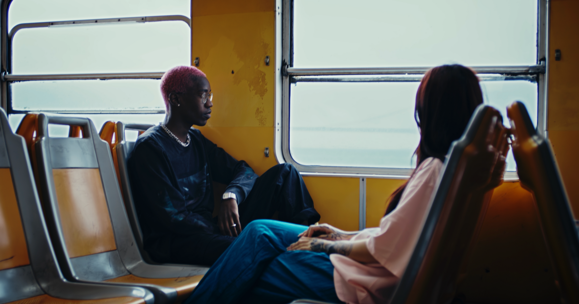 pastelle virgil longsleeve and daydreaming shortsleeve heavyweight cotton shirt worn by male model with pink hair and female model with brown hair in lisbon